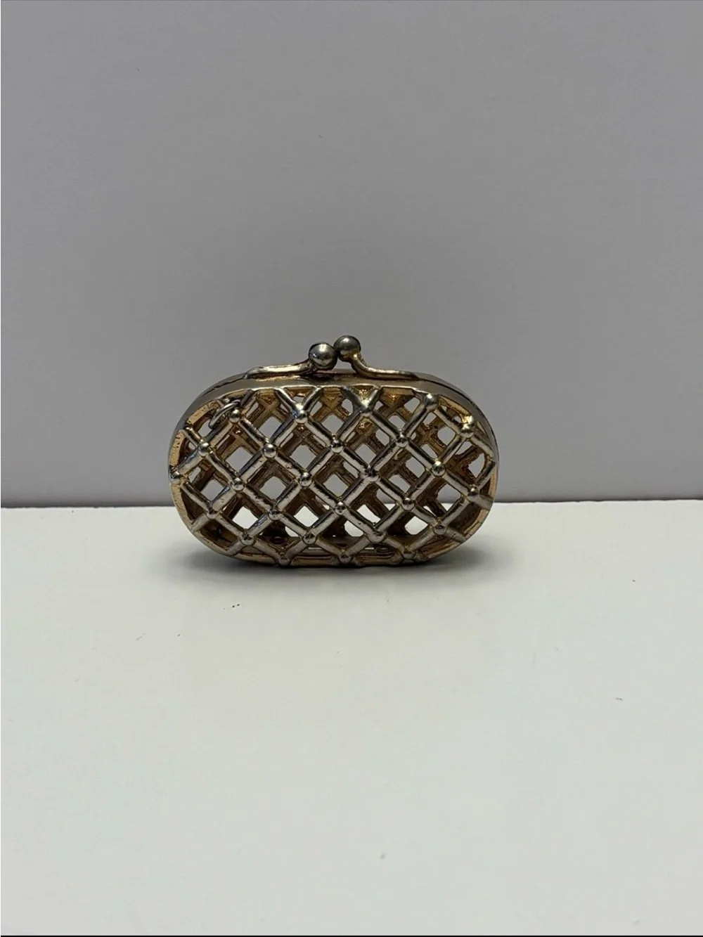 vintage metal cage or lattice-design mini coin clutch